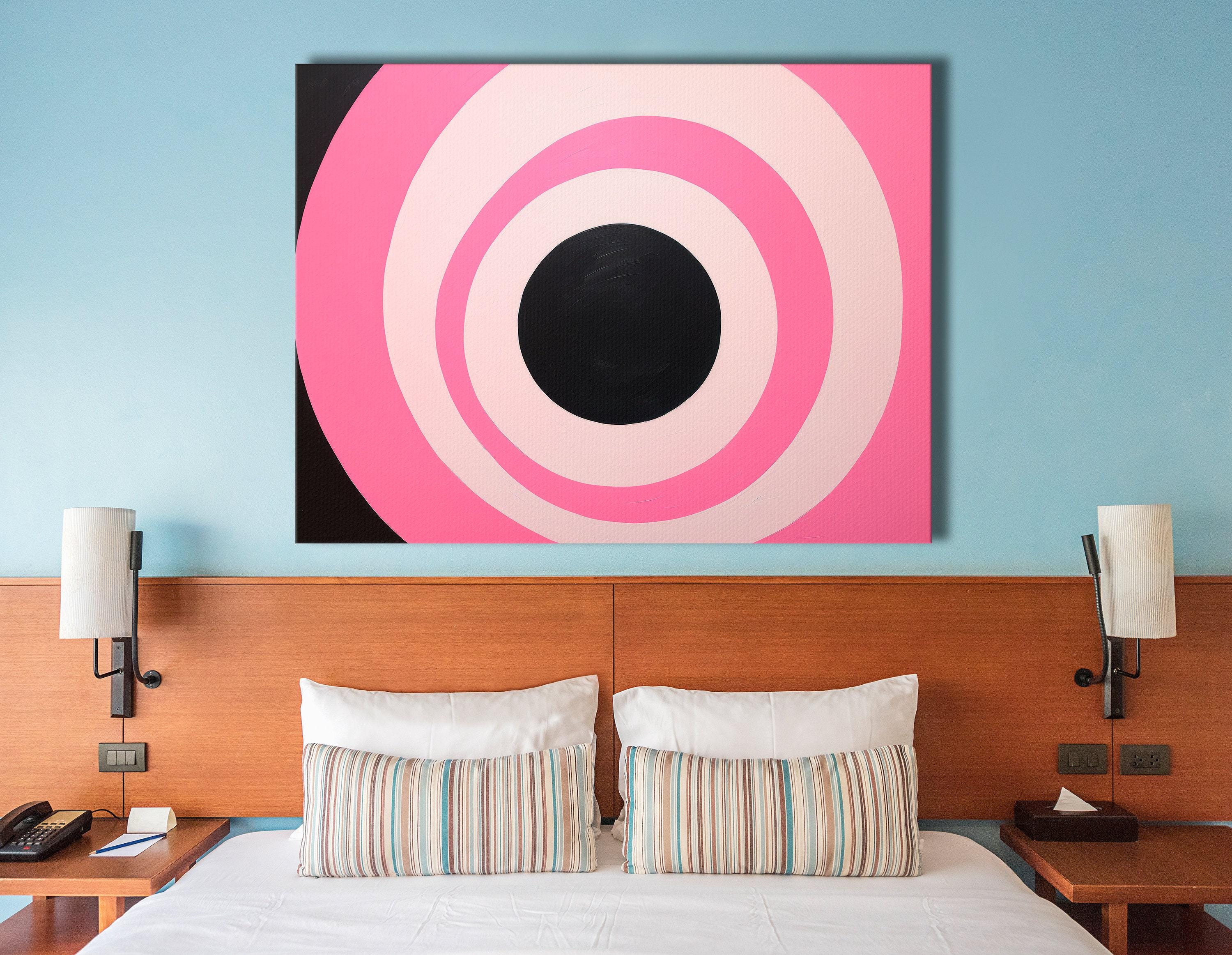 Hot pink and black concentric circles geometric artwork with pale ivory rings detail view