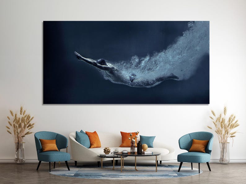 Underwater swimmer-like figure in a dark navy scene with foamy cyan-white splash