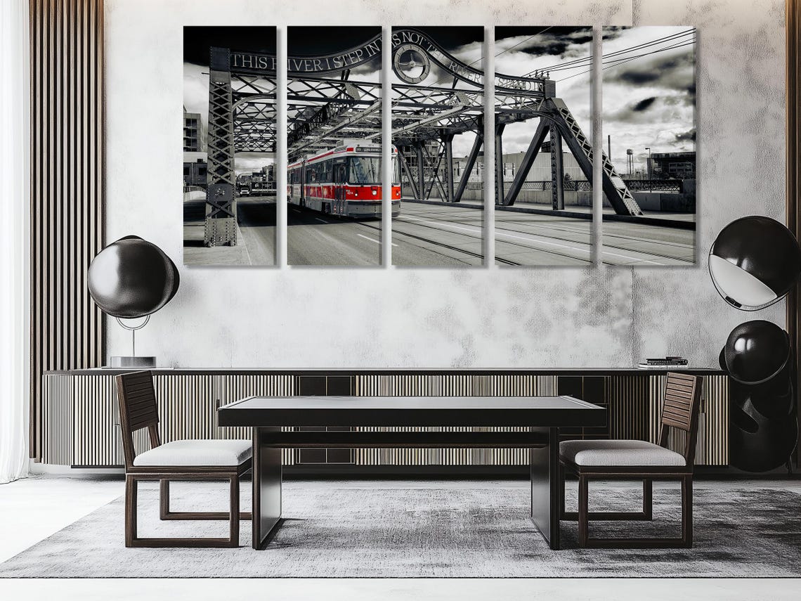 Mockup showing two chairs and a wall with three-panel bridge artwork above a console table