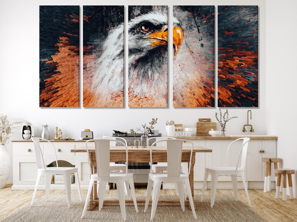 A pixelated eagle head fills the centre, rendered in white and grey with a vivid orange beak, set against a dark brick-like mosaic burst background