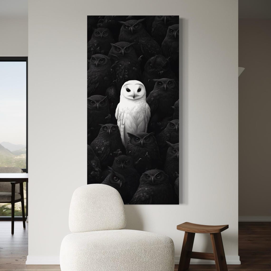 White and black owl wall art placed on a wall in a modern room mockup