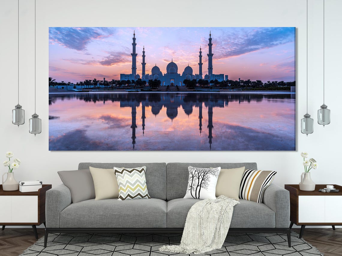 Room mockup showing a large twilight mosque artwork above a sofa