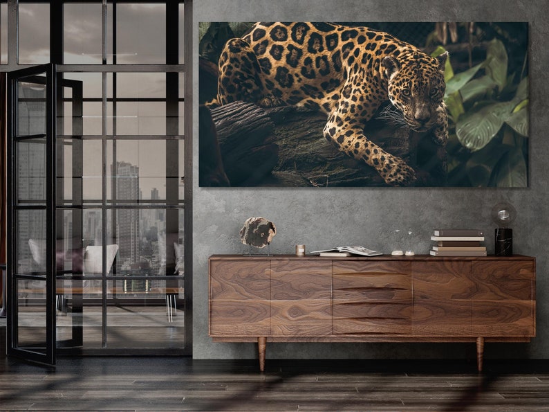 Realistic jaguar in a dark green jungle with warm golden fur and bold rosettes