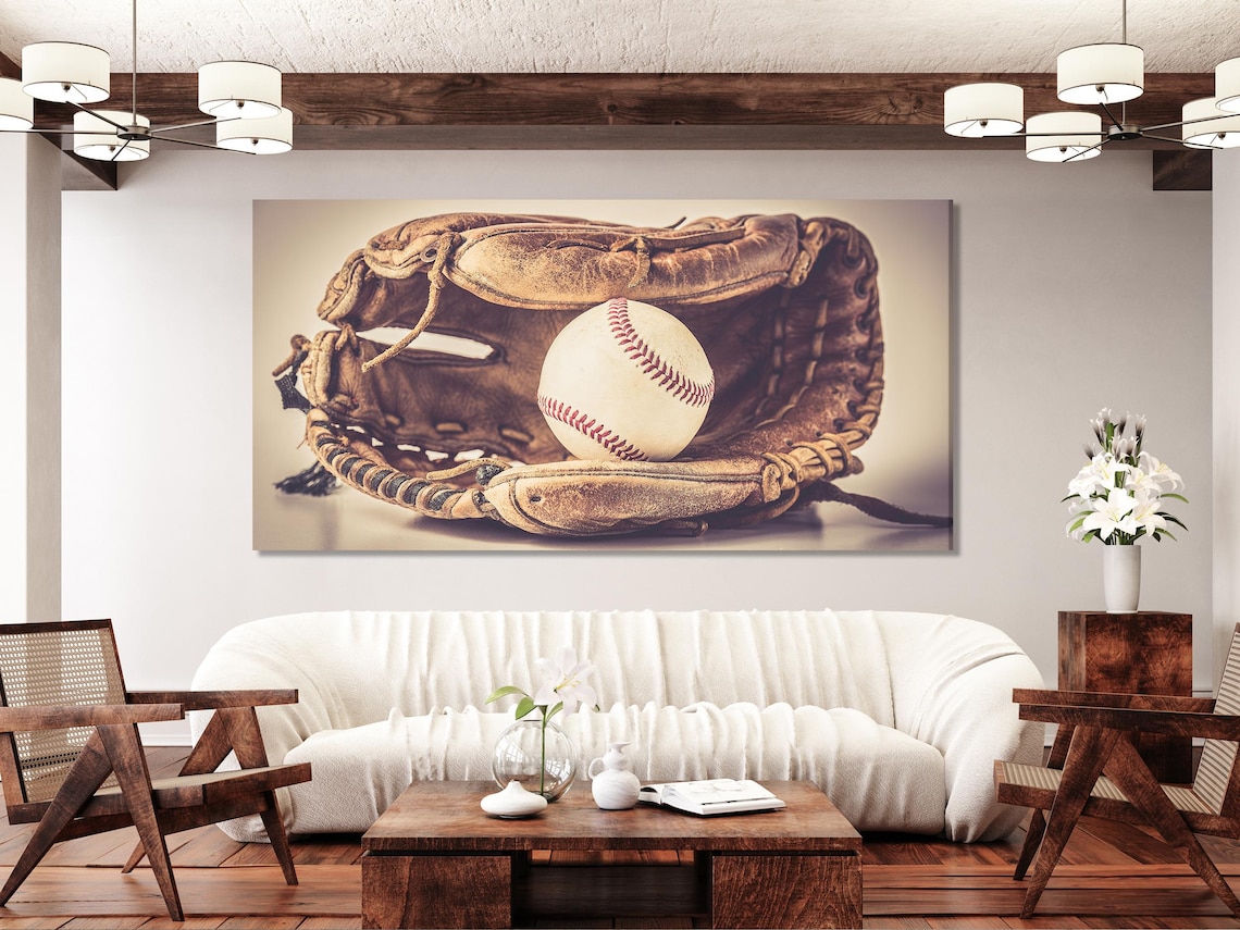 A sepia, vintage-style three-panel baseball scene shows a glove and ball resting on a bat-like object, with warm beige backgrounds and red stitching