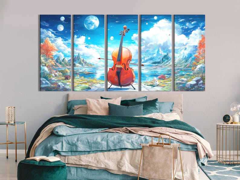 Orange cello in front of a blue sky landscape with mountains, clouds and a calm lake