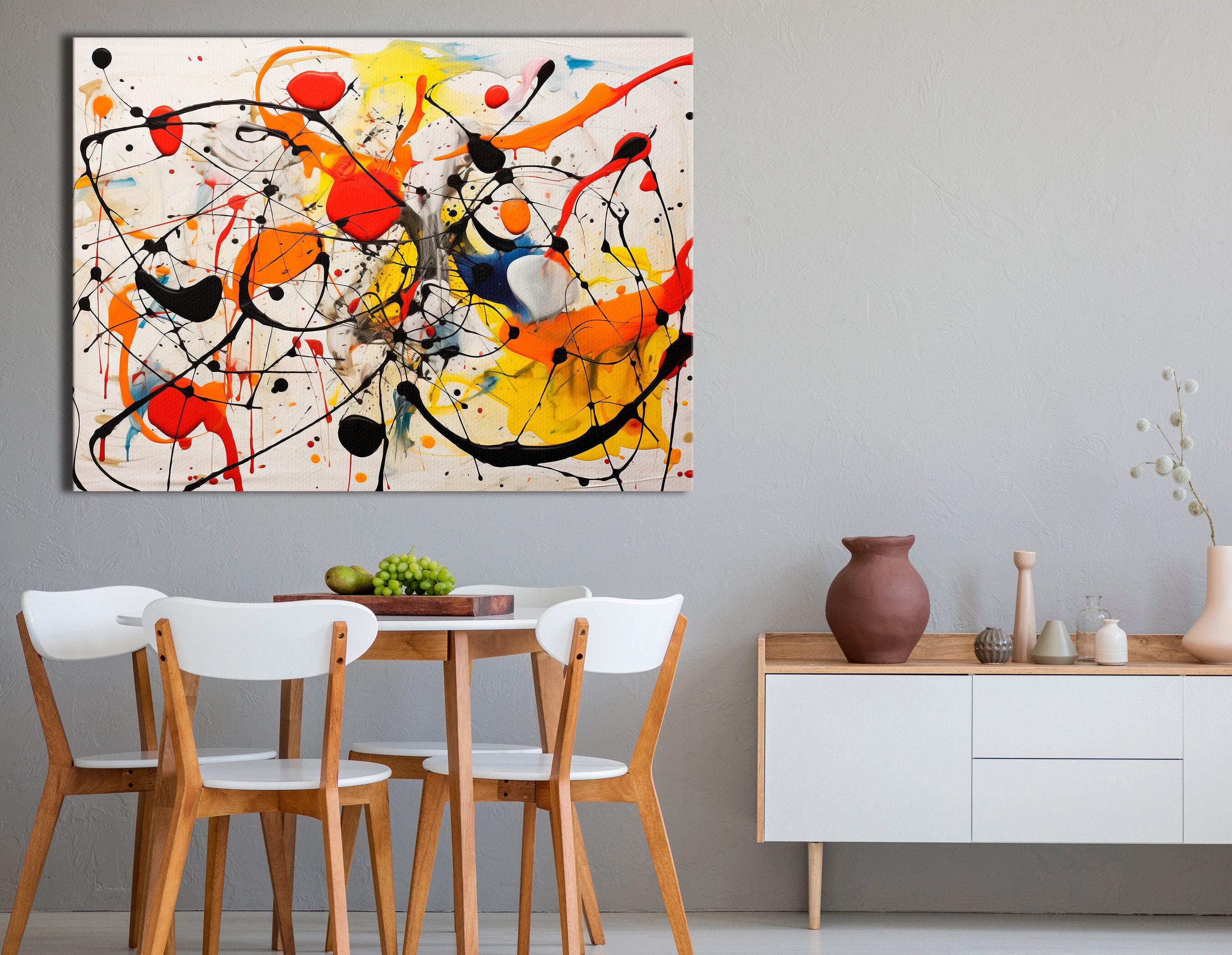 Abstract splatter artwork with black looping lines and red, orange, yellow and blue paint bursts on a white background detail view