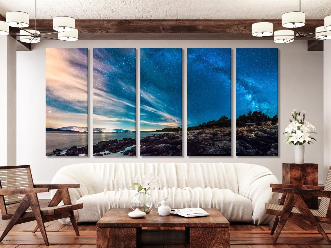 Room mockup with three Milky Way night sky coastline artworks above a bed
