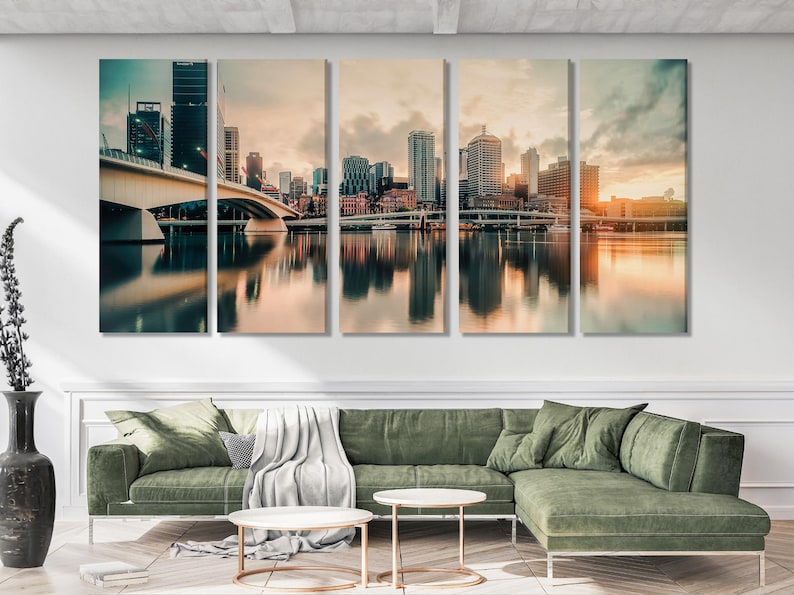 Multi-panel city skyline at sunset with skyscrapers, bridge structures, and river reflections