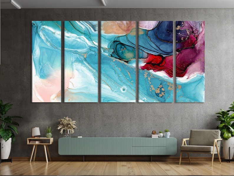 Five-panel fluid abstract artwork with teal and blue swirls, marbled white streaks and gold flecks, plus a magenta accent