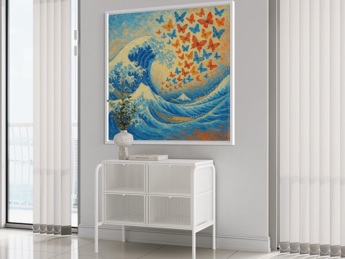 Painterly ocean wave in blue with scattered orange and blue butterflies on a pale background detail view