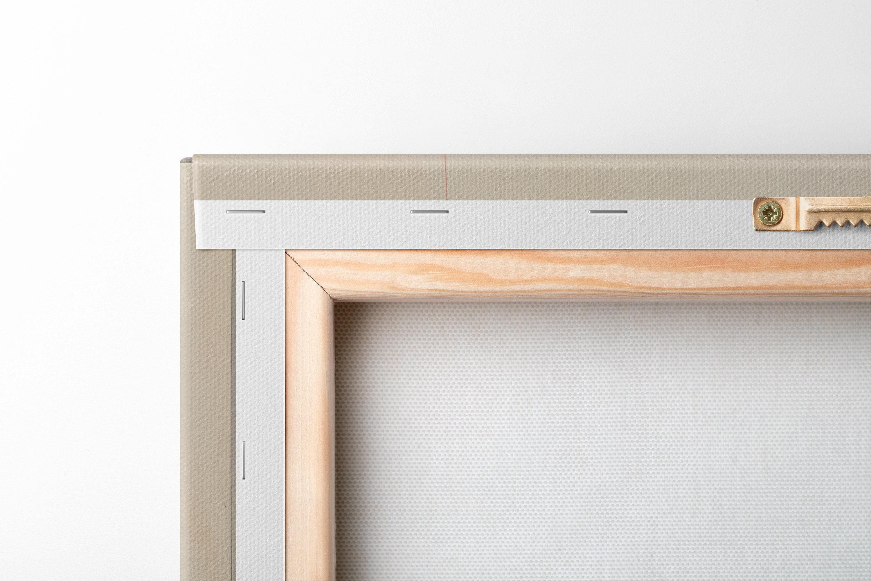 A framed abstract geometric composition combines muted sage and terracotta blocks with cream and burgundy lines in a balanced, mid-century style