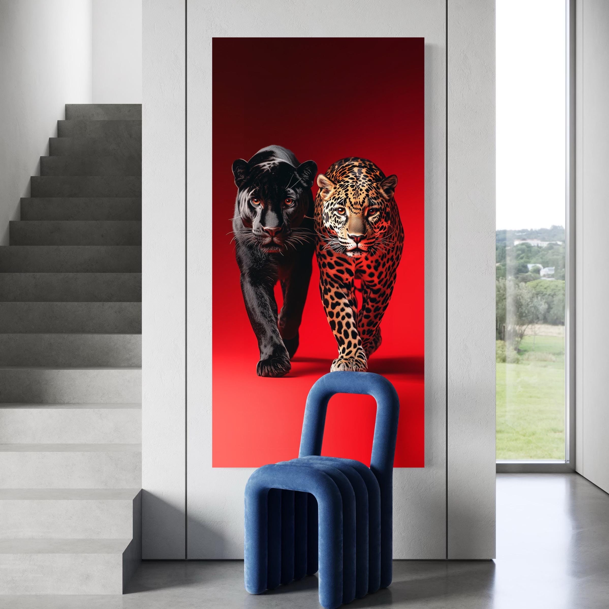 Portrait artwork of two big cats, one black and one spotted, against a vivid red background