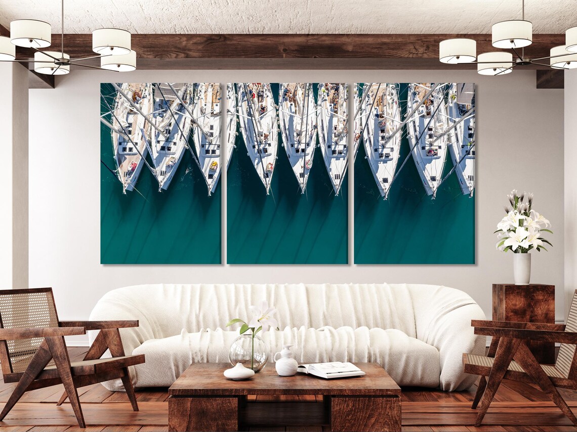 Dining room mockup with teal marina aerial sailboat artwork on the wall