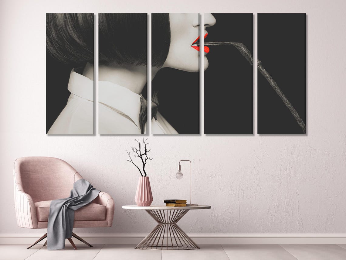 Black-and-white side-profile portrait with vivid red lips and a dark whip-like curve detail view