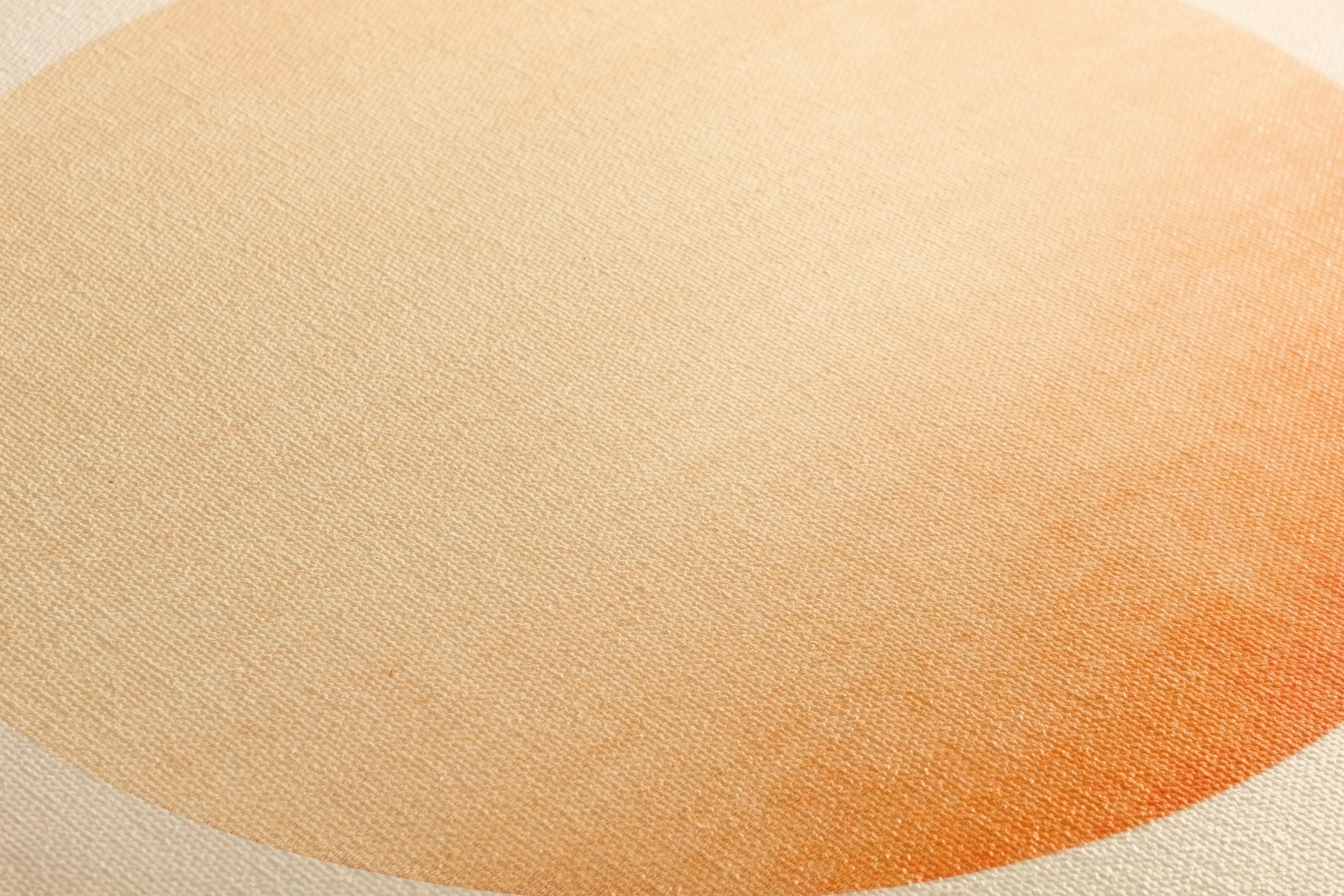Peach and cream abstract circle gradient on a light cream background detail view