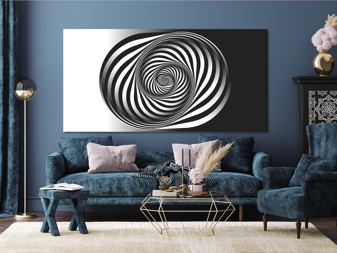 A monochrome spiral of tightly curving white and black bands draws inward to a small central swirl, creating an optical illusion effect detail view