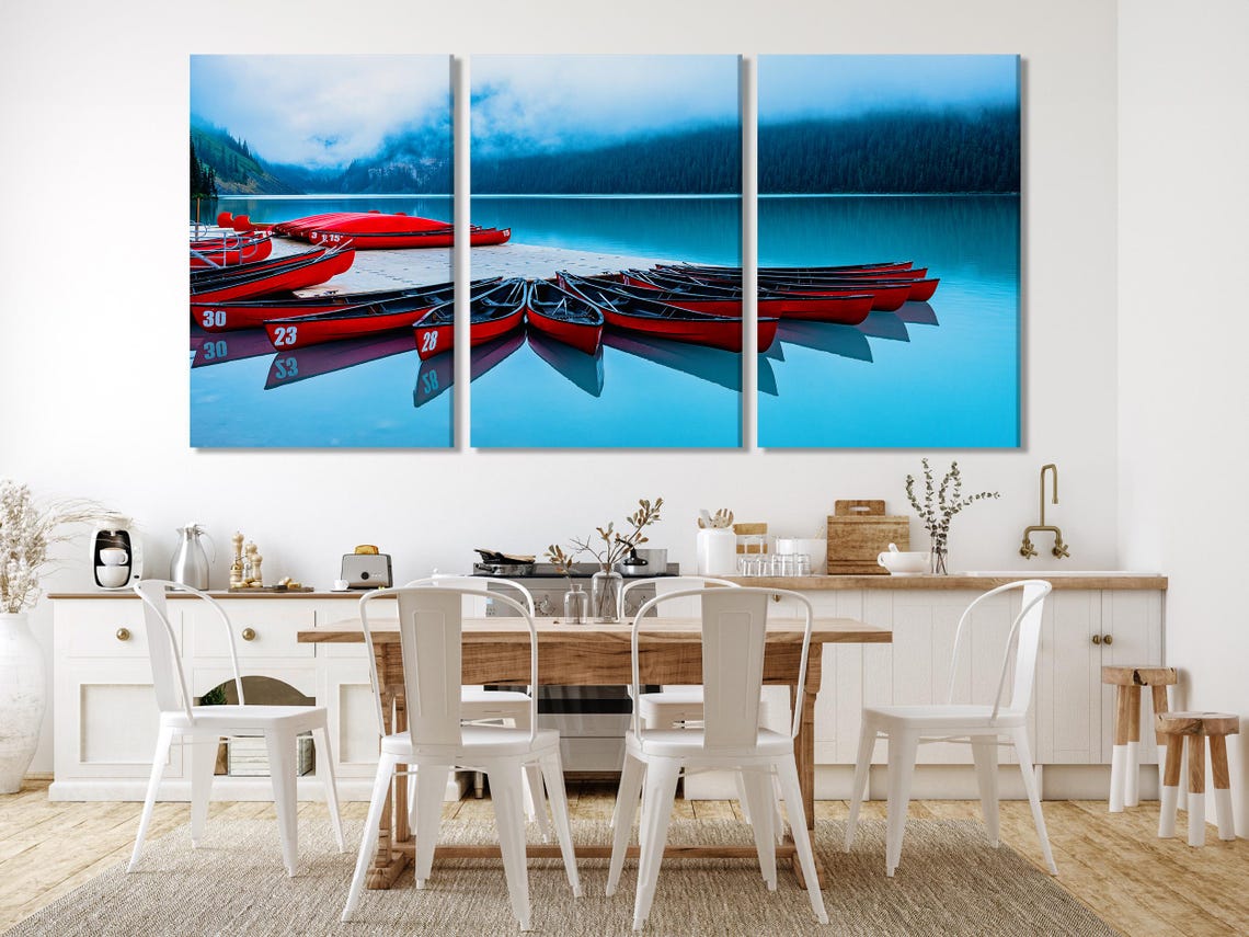 Room mockup showing a large landscape artwork on a white brick wall