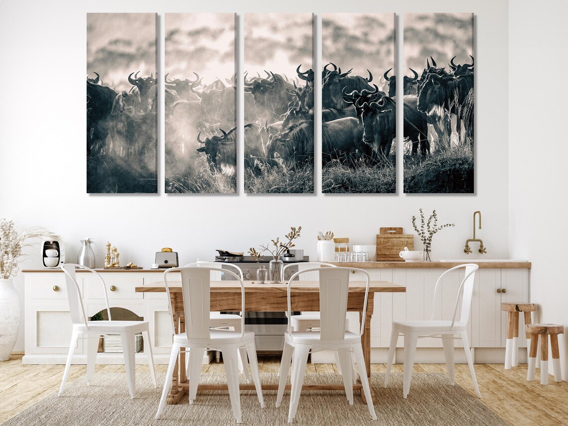 Monochrome artwork of a wildebeest herd with curved horns in dusty haze detail view