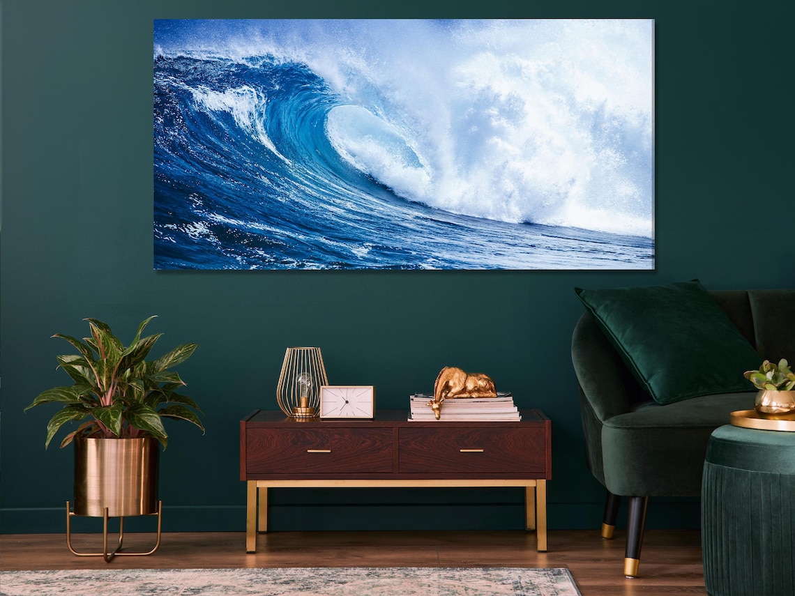 A split set of ocean wave scenes shows a powerful crest breaking, with deep blues and foamy white spray against a bright sky backdrop detail view