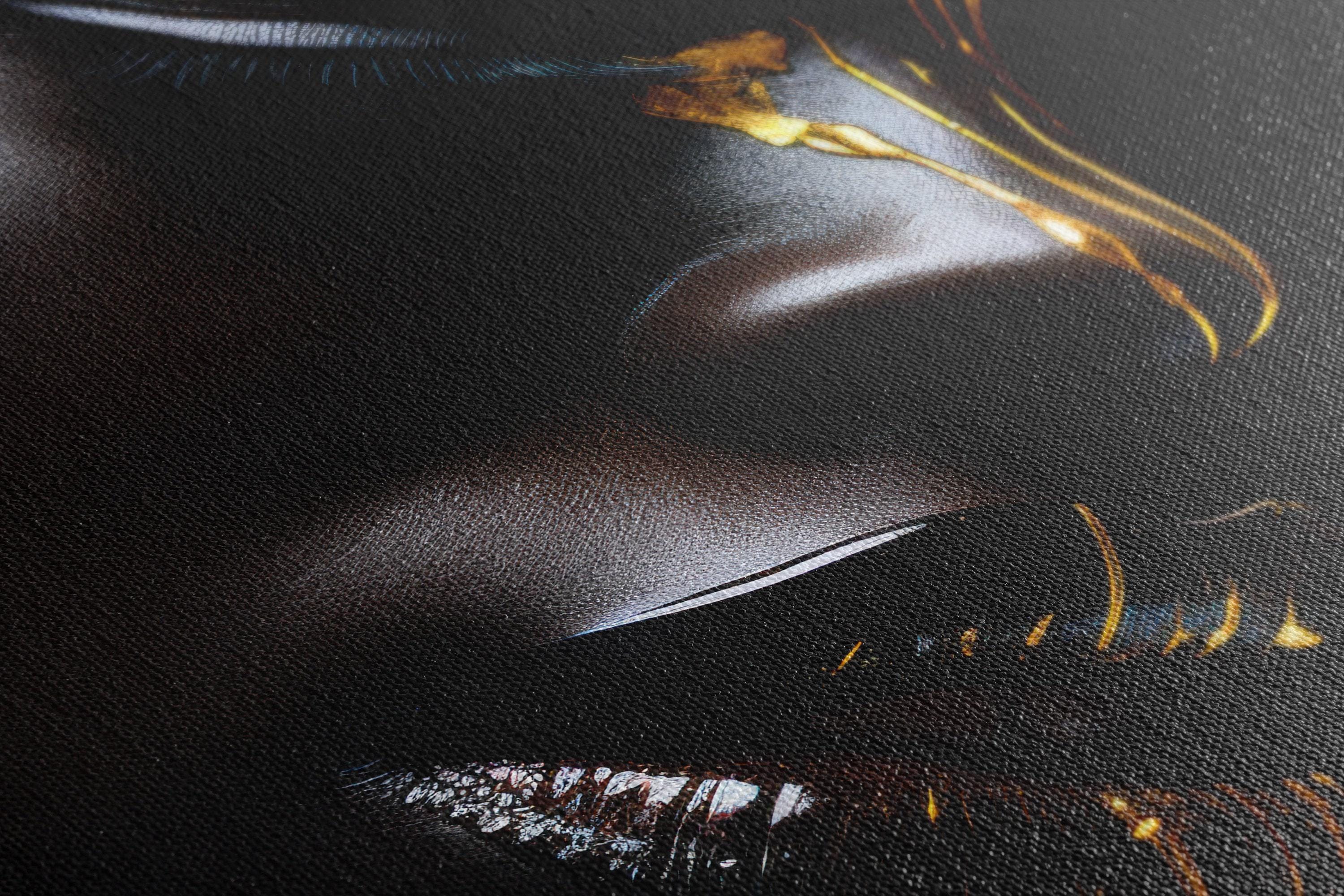 A dark, near-black and gold portrait-style image shows a stylised female figure with dramatic lighting and metallic gold accents detail view