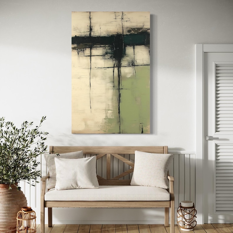 Abstract artwork with pale cream and muted green blocks and dark charcoal line marks