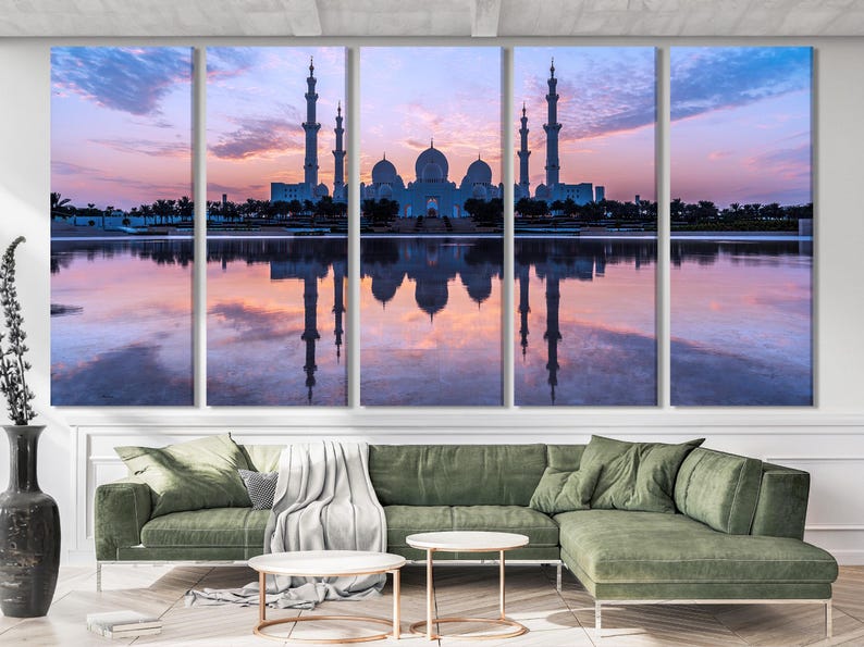 Twilight mosque with tall minarets and domes reflected in calm water