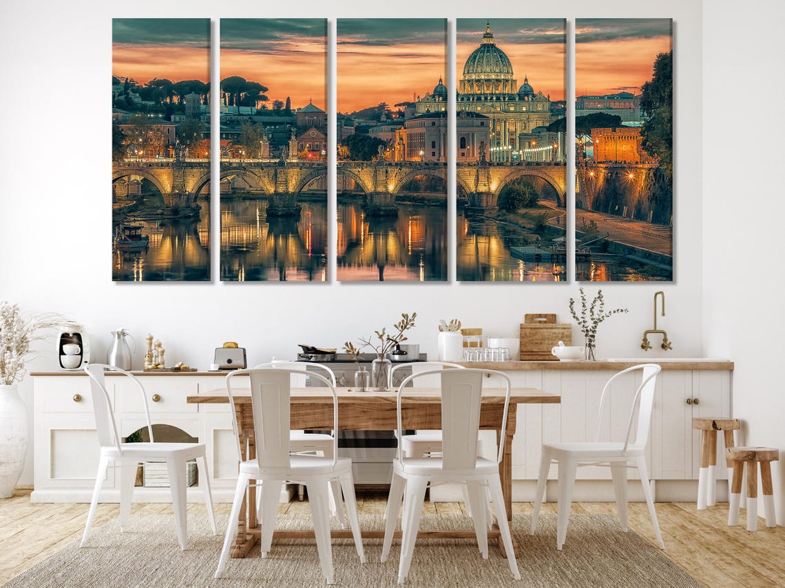 Rome cityscape at sunset with a lit domed basilica, arched bridge spans and river reflections detail view
