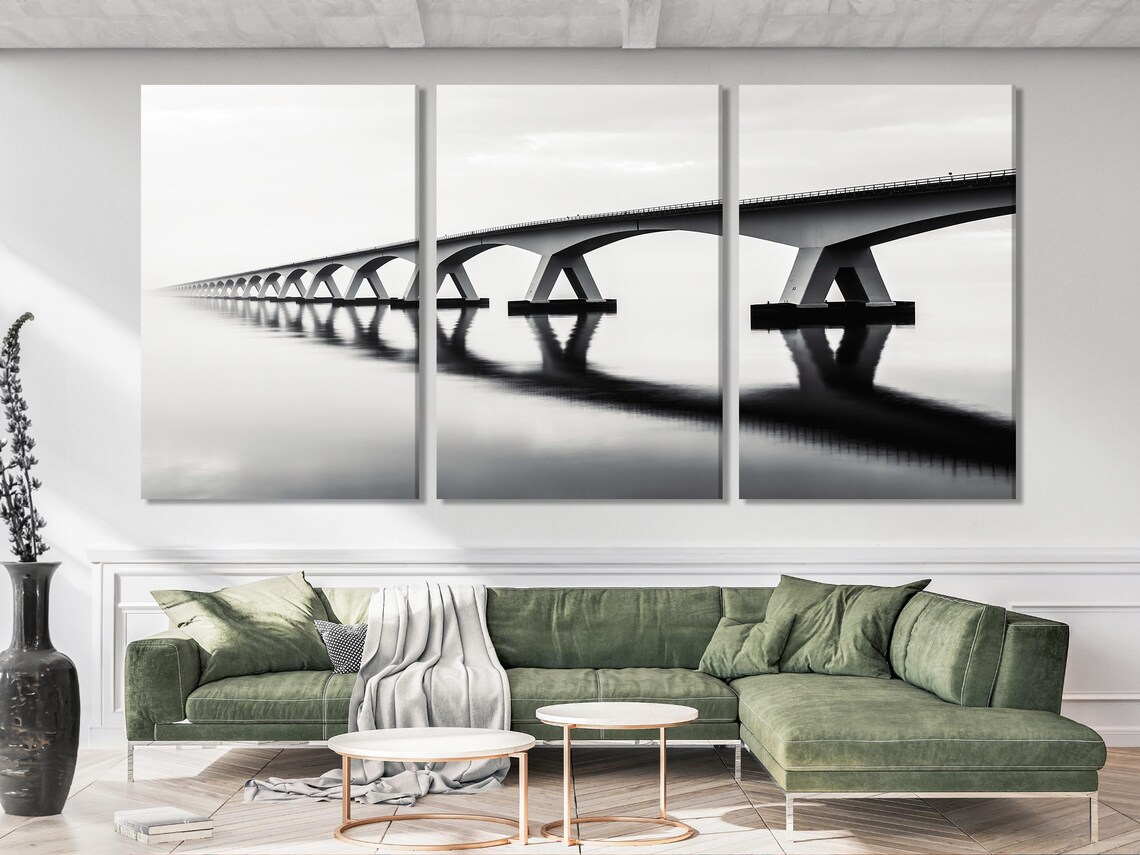 Room mockup showing a black and white arched bridge artwork above a wooden sideboard