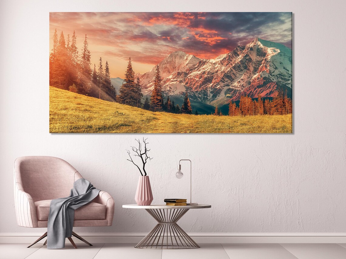 Room mockup showing a sofa and wall with five vertical mountain landscape artworks