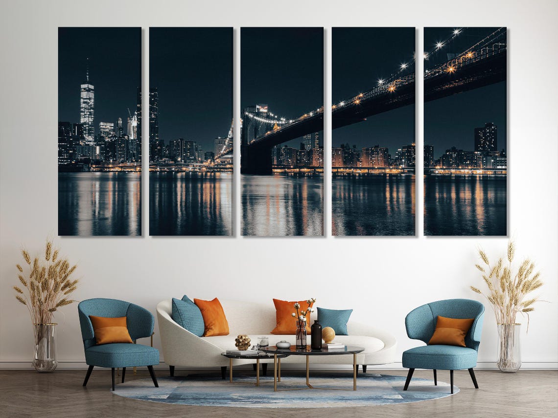 Room mockup showing a night cityscape bridge artwork above a sofa
