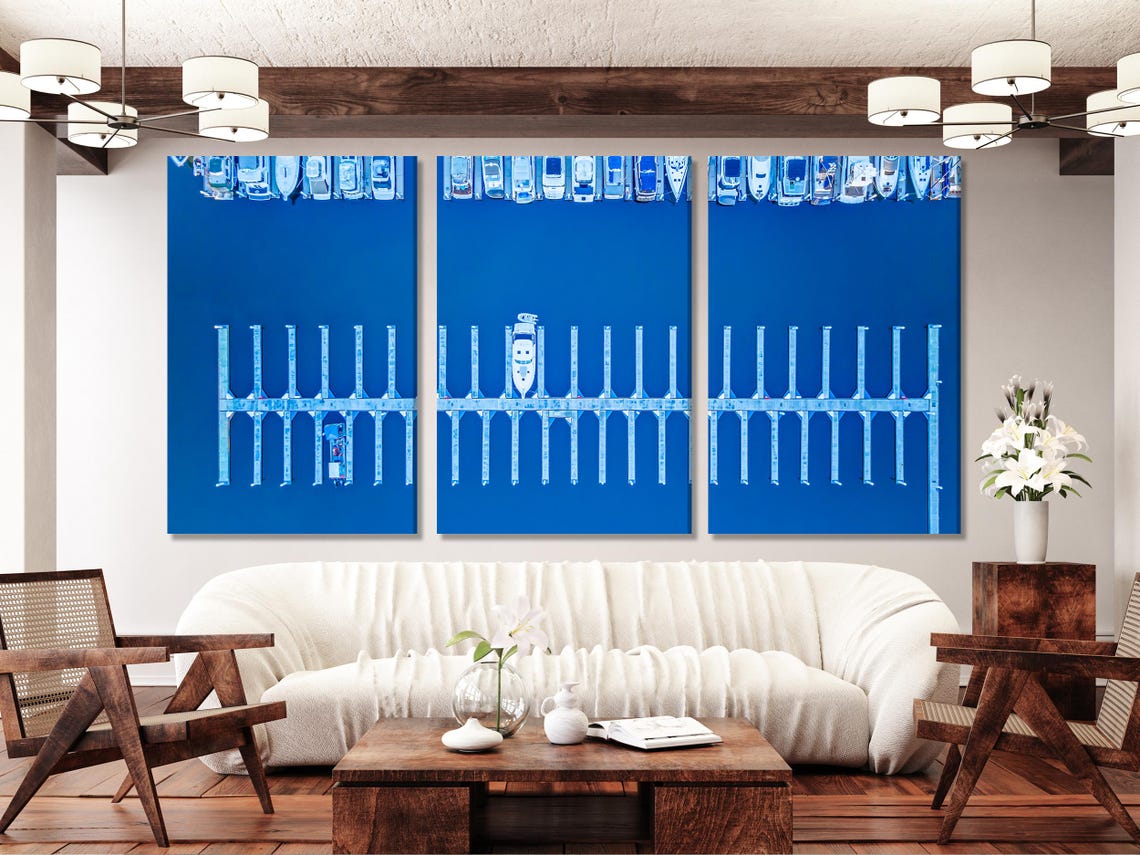 Dining room mockup with a blue marina harbour artwork above a table