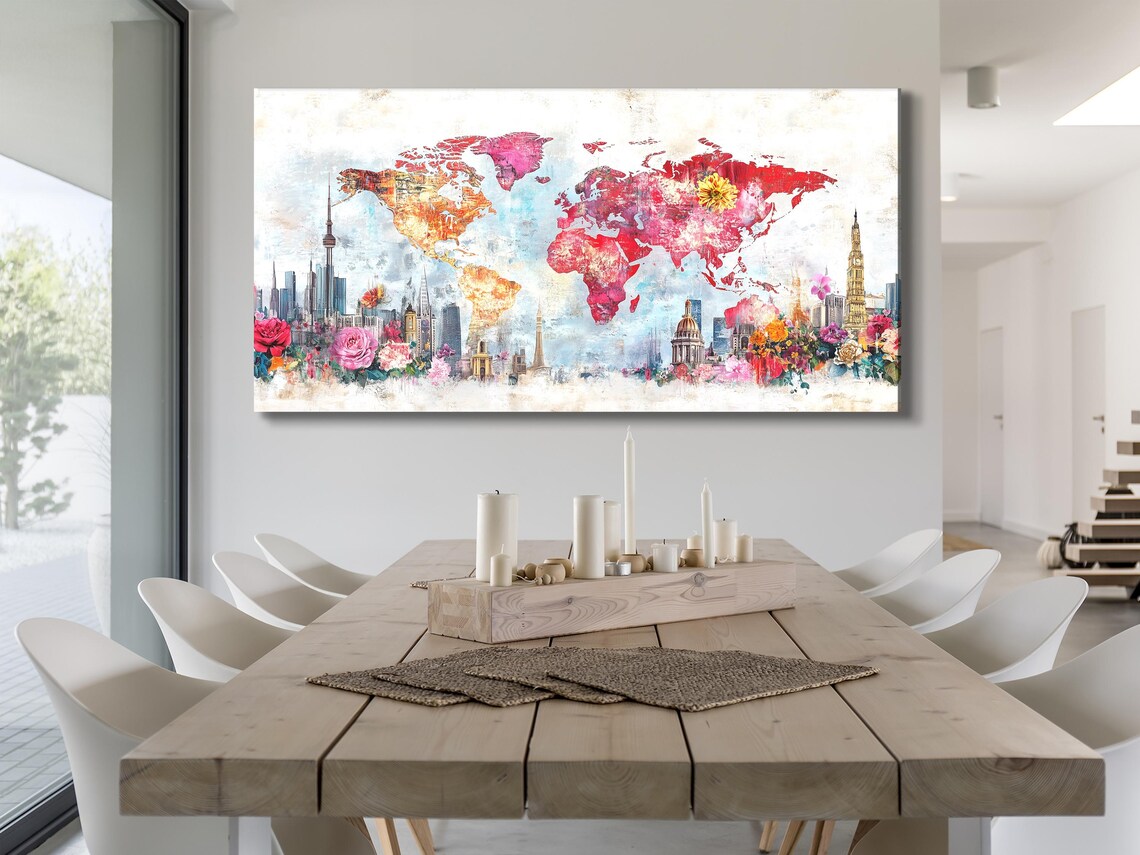 Colourful world map with city skylines and clusters of pink and red flowers detail view