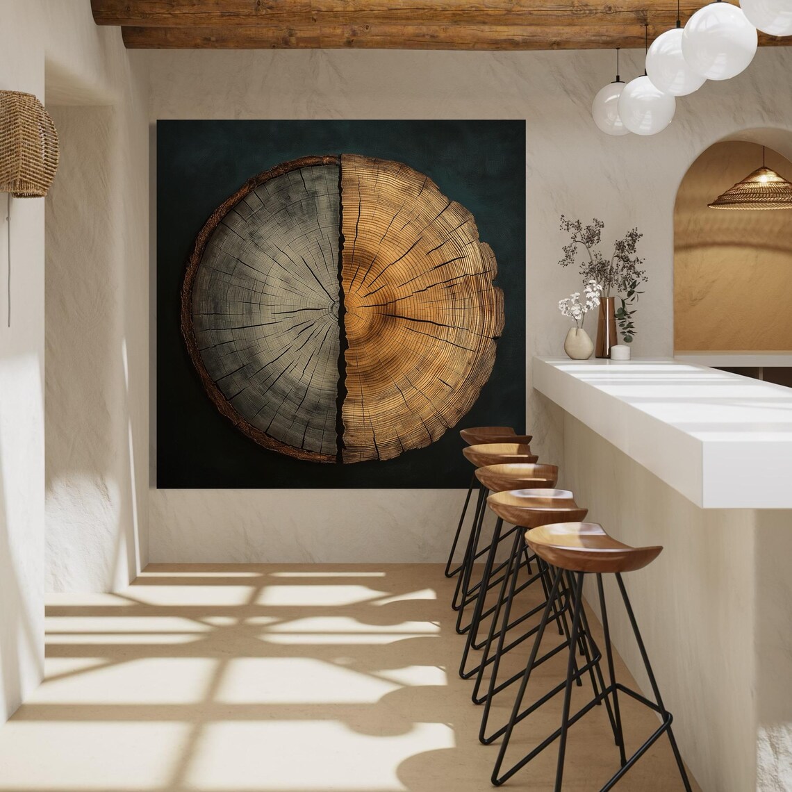 Tree ring wall art displayed on a wall above a chair and side table