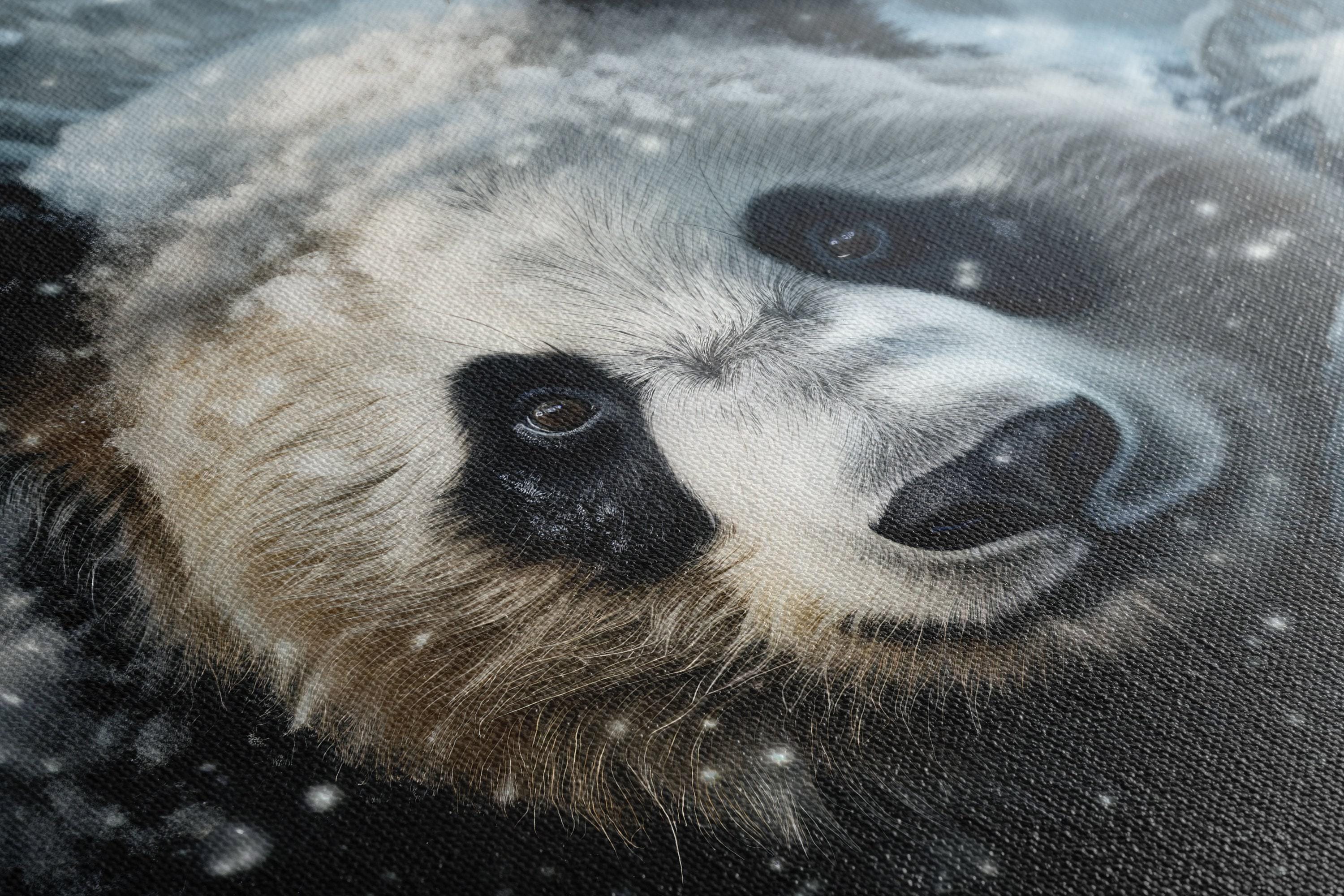 Snowy panda face artwork with falling snow and dark evergreen trees detail view
