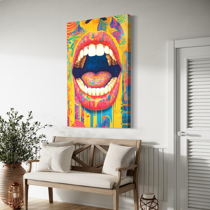 Stylised open mouth with bright teeth and multicolour heart, framed by graffiti-like swirls
