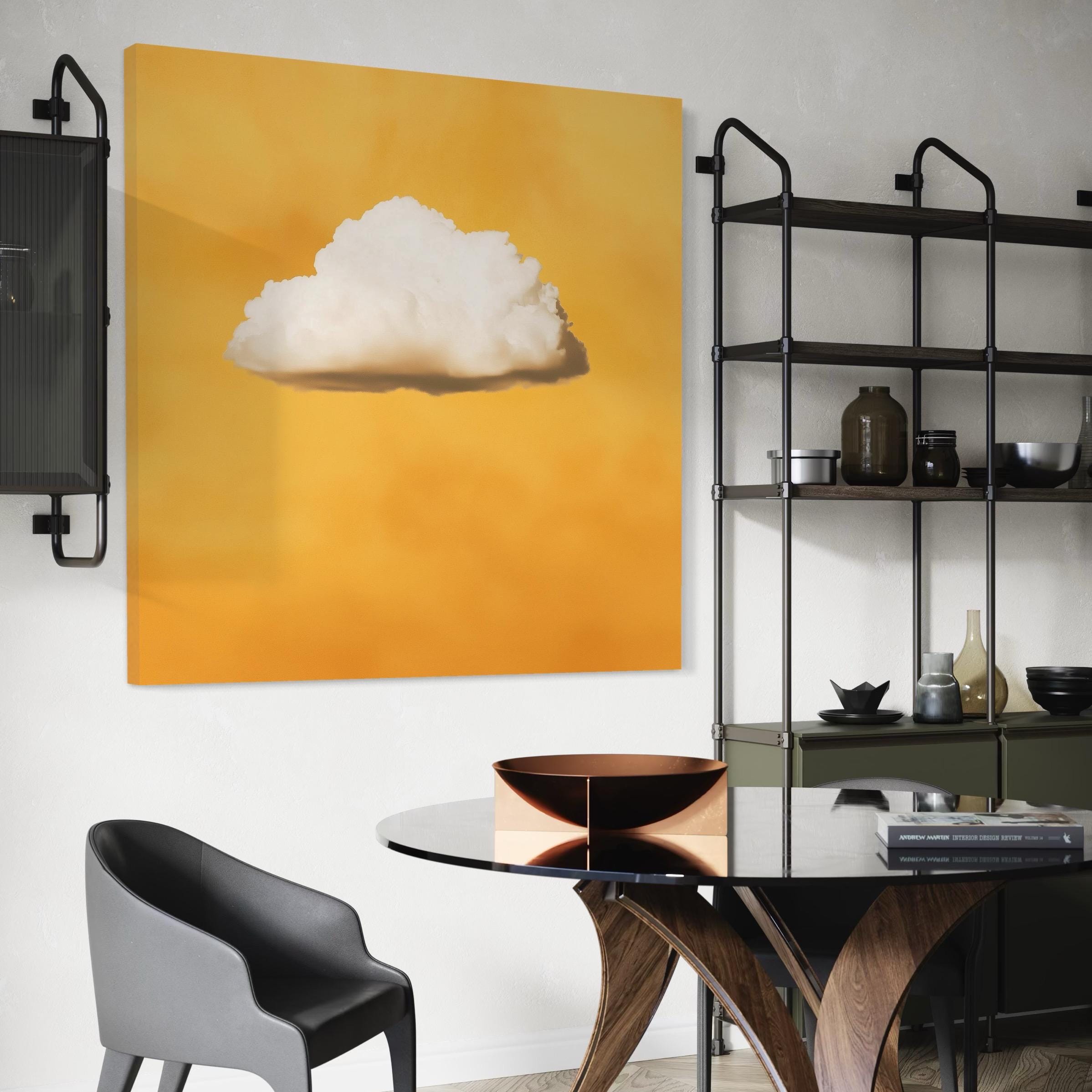 White cloud artwork hanging above a sofa with pillows in a bright room