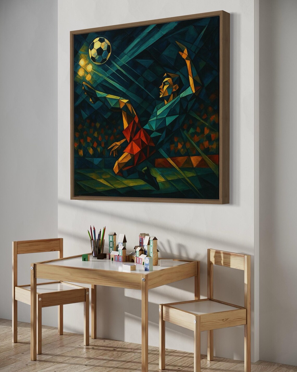 Artwork of geometric low-poly soccer scene hung on a wall above a bench and chair