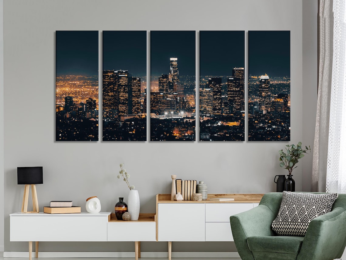 Living room mockup with a framed night city skyline artwork above a sofa