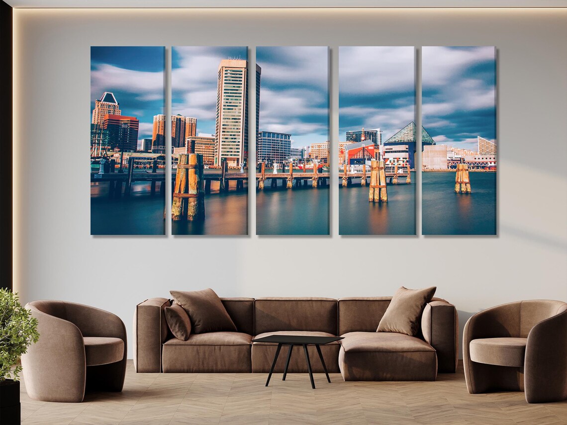 Room mockup showing a waterfront cityscape artwork above a sofa