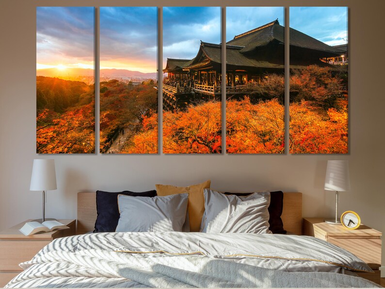 Autumn sunset landscape with a temple building and bright orange trees under a blue sky