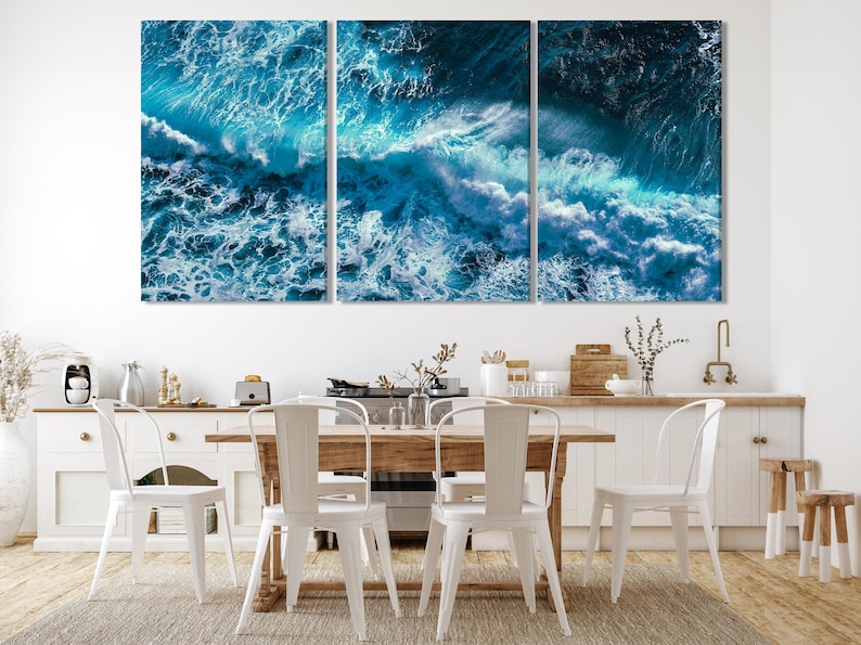 Triptych of aerial ocean waves with teal and deep blue water and white foam