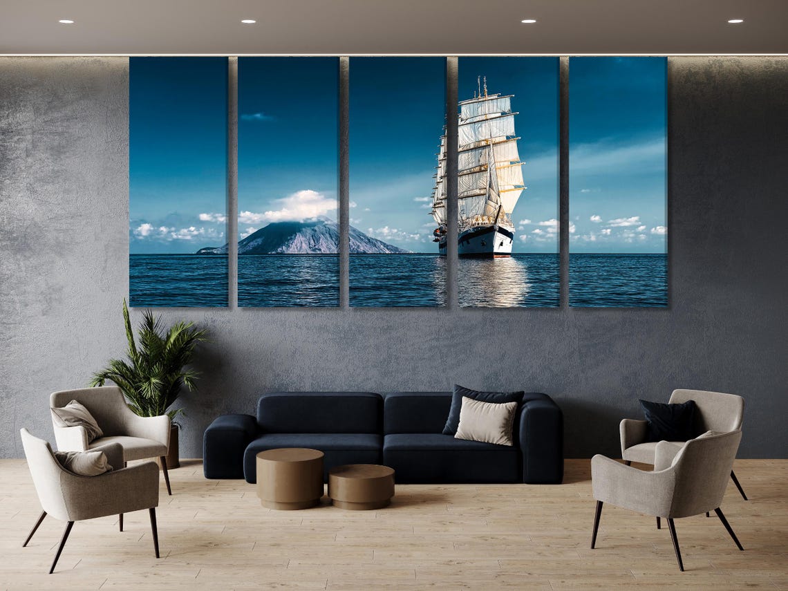Sailing ship wall artwork displayed in a living room with wooden accents and lamps