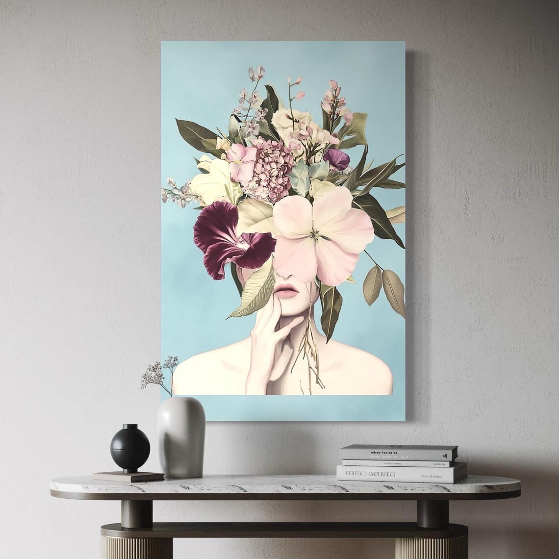 Artwork of a pastel floral woman portrait displayed above a sofa in a living room mockup
