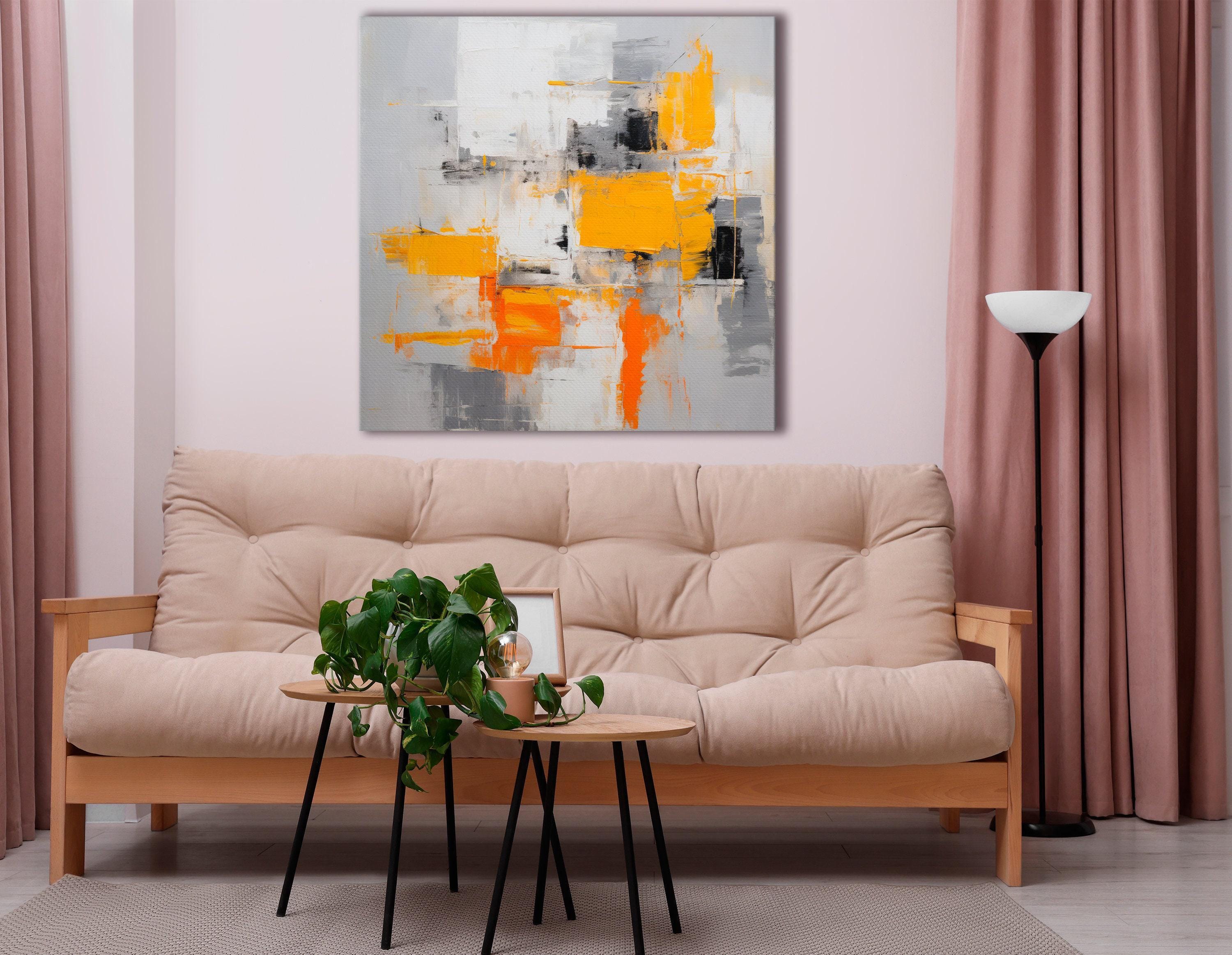 An abstract city-block style collage of white, grey and black shapes is overlaid with bright yellow and orange blocks, accented by scumbled