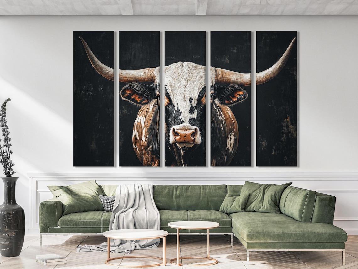 A three-panel artwork shows a longhorn-style cow portrait with sweeping horns against a dark, textured background, in high-contrast black, cream and