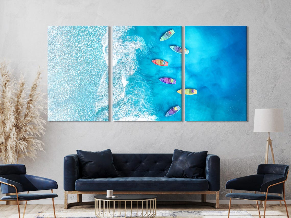 Dining room mockup with blue and white ocean artwork panels above a table