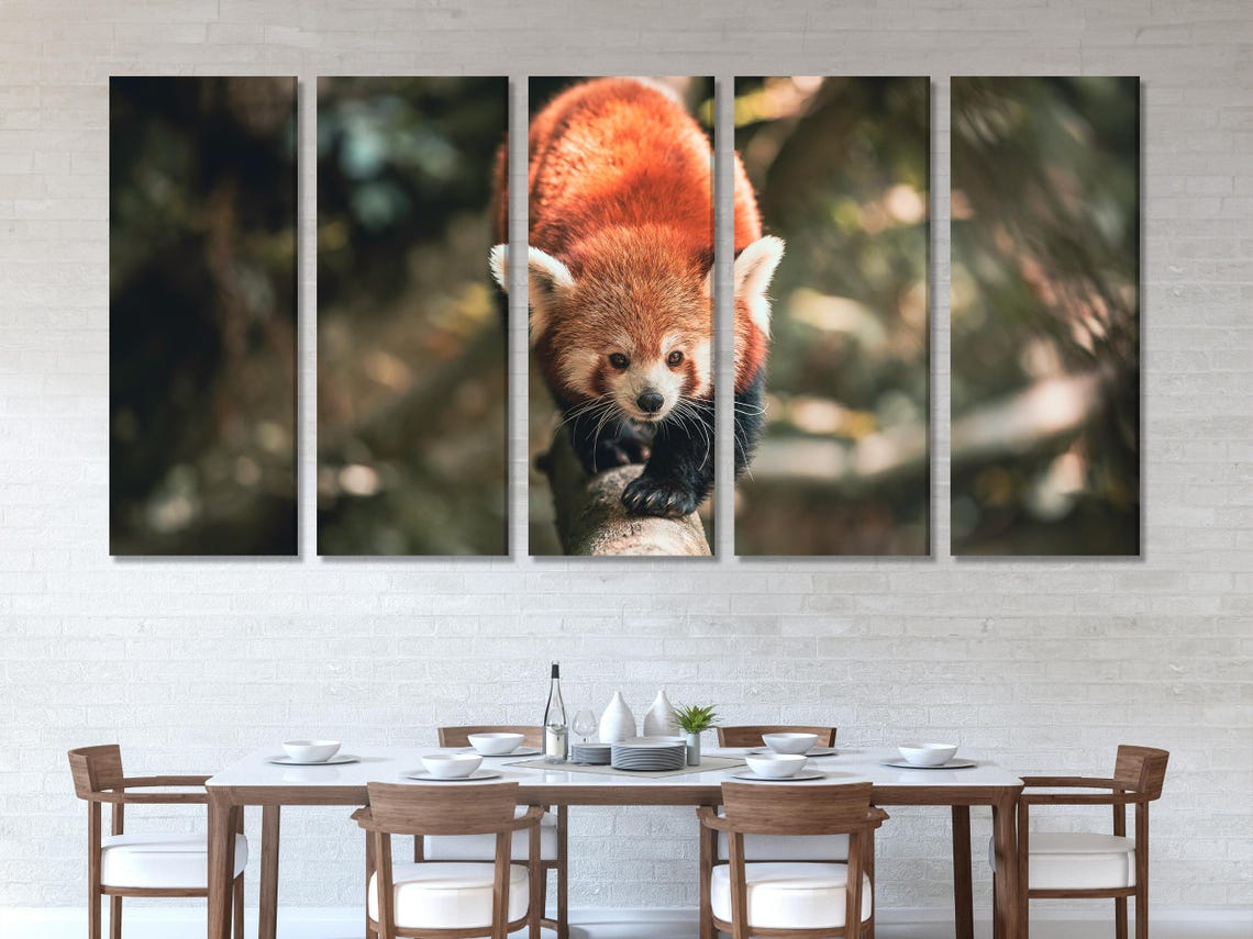 Room mockup showing a framed red panda artwork above a sofa