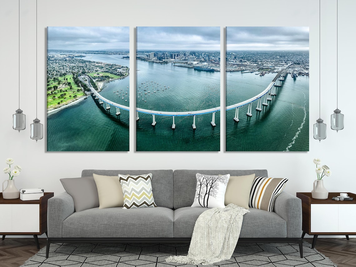 Dining room mockup with a panoramic bridge artwork on the wall above a table