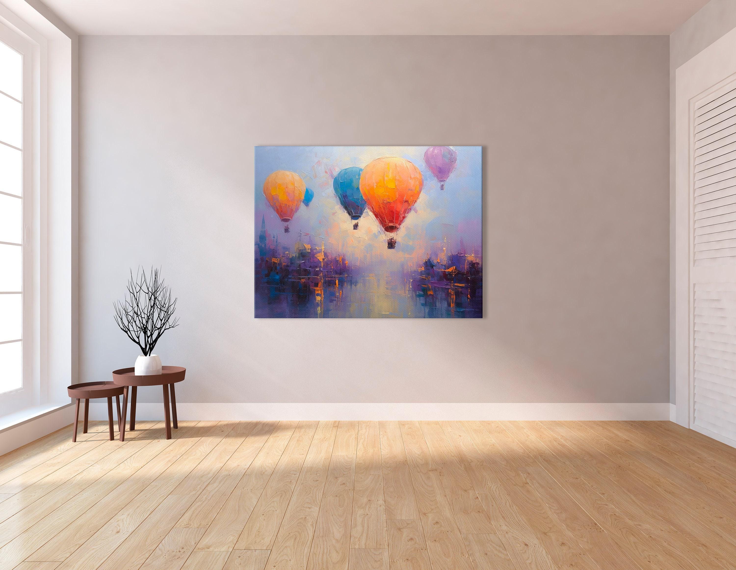 Three colourful hot air balloons floating above a stylised city at sunset detail view