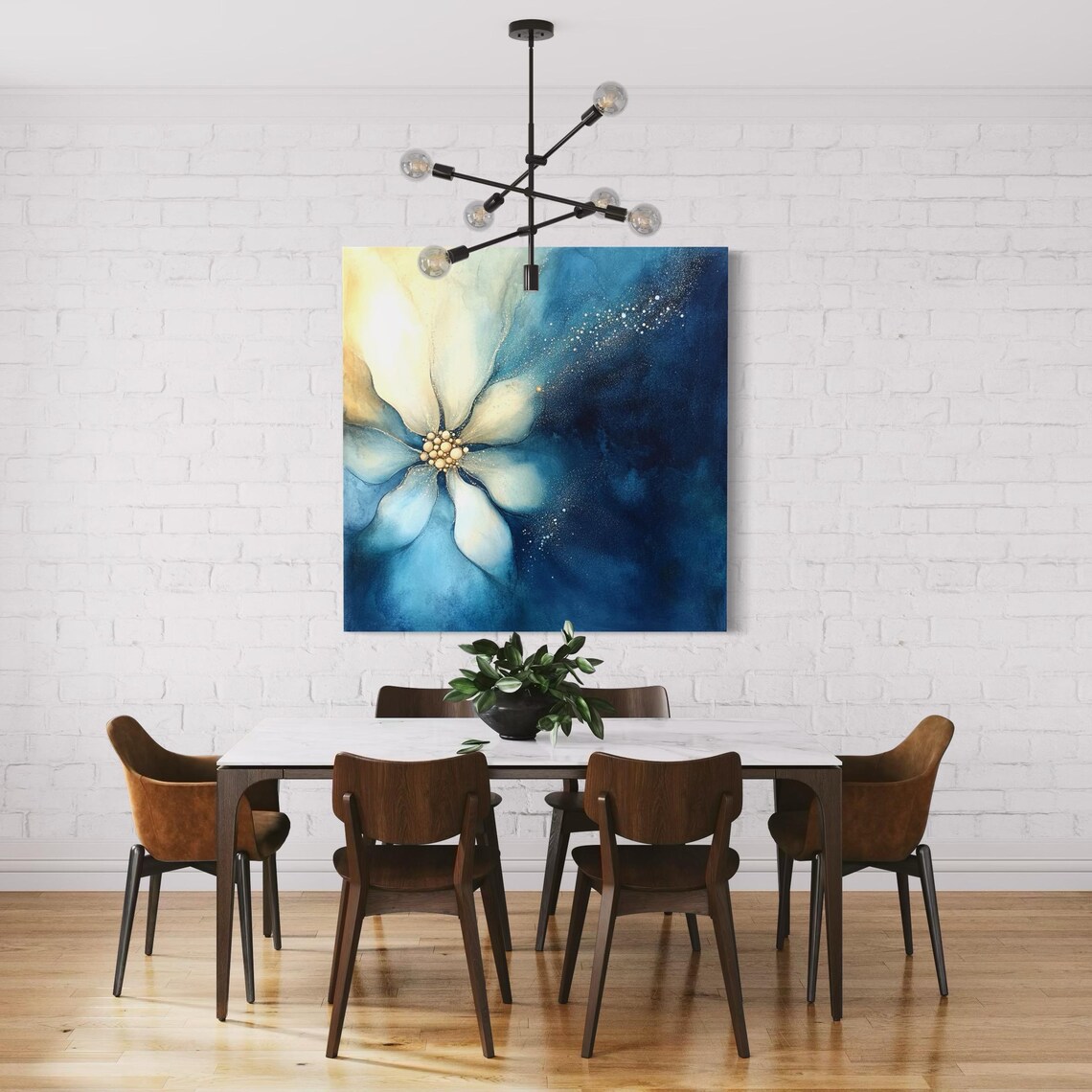 Abstract flower artwork with cool blue petals, soft ivory highlights and a warm gold bead-like centre detail view